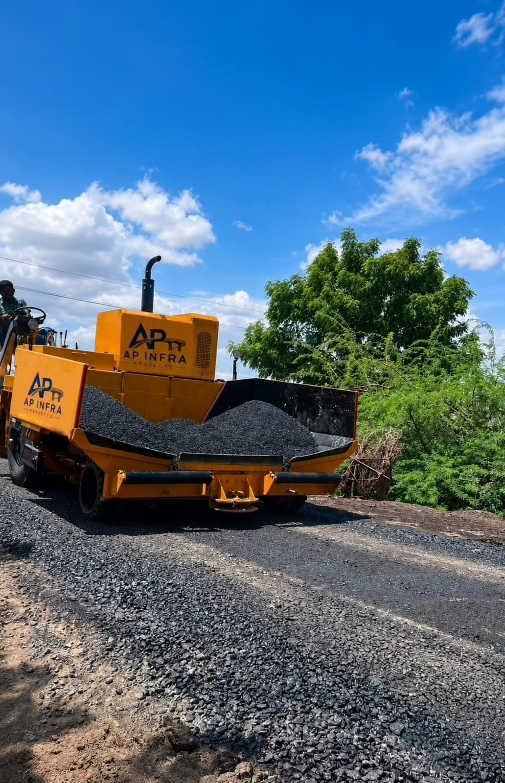 Aggregate loaded into the paver ahead of laying, keeping the crew on schedule.